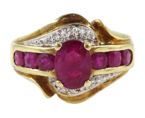 Gold ruby and diamond cluster ring, stamped 10K