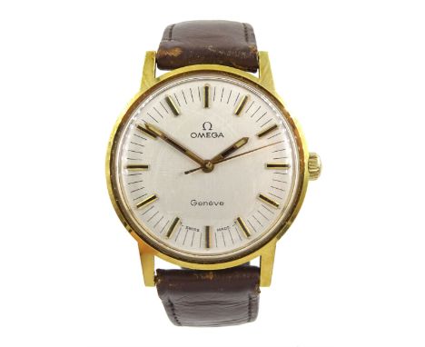 Omega Geneve gentleman's gold-plated manual wind wristwatch, on original brown leather strap