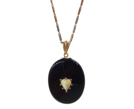  Victorian gold mounted black enamel mourning picture back pendant, the centre with heart shaped opal and diamond surround, o