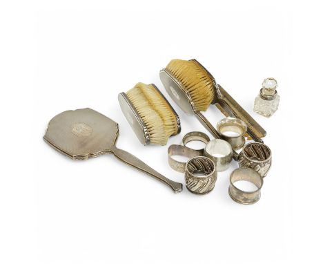 A George V engine turned silver mounted six piece mirror, brush and comb set by William Comyns &amp; Sons Ltd, London, 1933, 