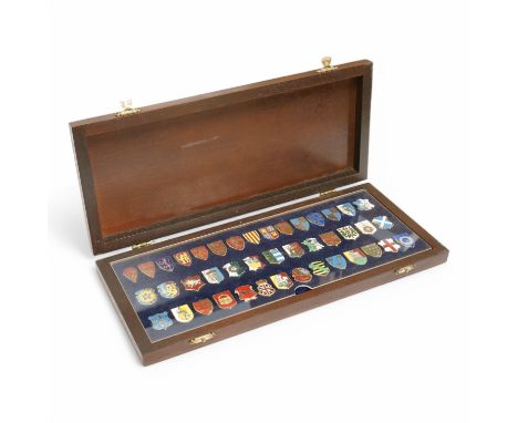 A cased set of forty two modern silver and enamel and silver gilt and enamel Heraldic shield plaques, depicting British monar