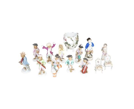A nine piece German porcelain monkey band, a Meissen figure of a cherub together with other 19th century and later porcelain,
