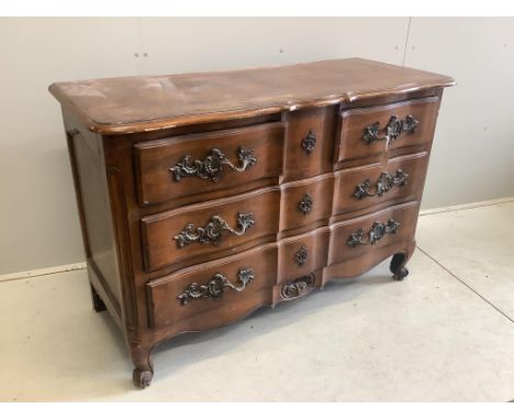 An 18th century French walnut three drawer commode, width 128cm, depth 53cm, height 86cm. Condition - fair
