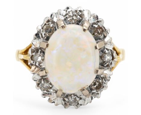 An opal and diamond cluster ring, the cabochon opal within a border of single-cut diamonds, mounted in 18ct gold, size K, len
