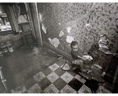 Bruce Davidson (American, b. 1933), gelatin silver print, Child on a rocking horse, from the Harlem Series, 26 x 33.5cm. Cond