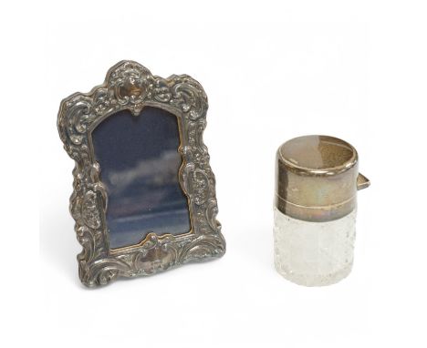A late Victorian silver mounted cut glass salts bottle, R Hovenden &amp; Sons Ltd, Birmingham, 1895, 80mm, together with a sm
