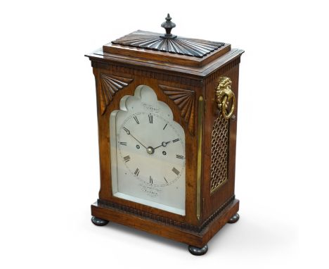A William IV rosewood bracket clock, signed Purvis, North Audley Street, London, the twin fusee movement striking on a bell, 