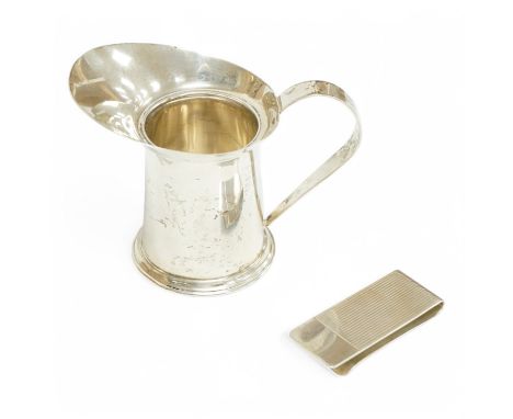A small Cartier sterling '2oz' jug, numbered 88, lacking cover?, 74mm, together with a Tiffany &amp; Co sterling 925 money cl