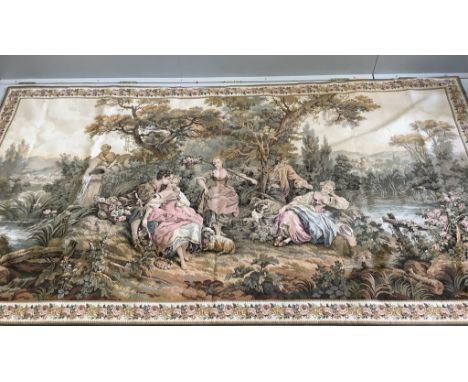 A Belgian polychrome machined tapestry panel, width 280, height 150cm, with metal hanging rail. Condition - good