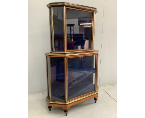 A 19th century satinwood banded brass mounted vitrine, width 110cm, depth 36cm, height 182cm. Condition - good