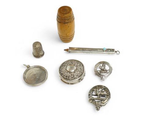 A late Victorian repousse silver circular pill box, maker FD, Birmingham, 1887, 37mm, together with a George IV Scottish whit
