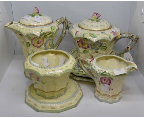 Beswick part teaset, with rose floral detail including teapot, sugar basin, hot water pot, stand, two plates and a milk jug (