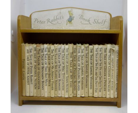 Peter Rabbit interest; a set of 25 books on a Peter Rabbit book shelf