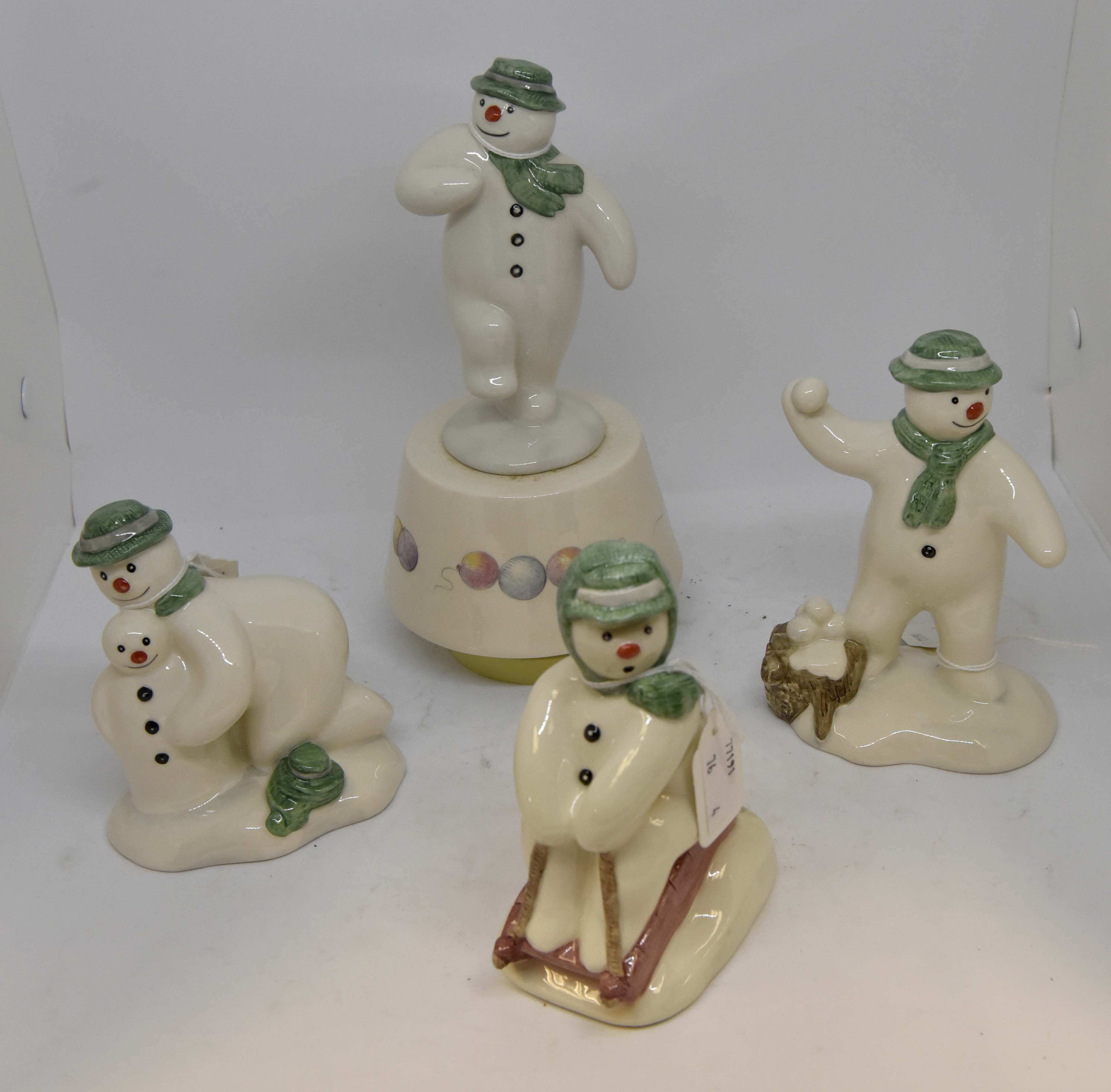 Royal Doulton The Snowman figurines including; Toboganning, Build a