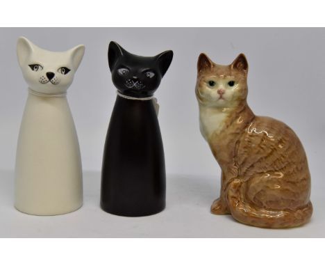 A pair of stylised Beswick ceramic cats, numbers 2156 &amp; 2157 along with a Beswick Ginger Cat, seated and head looking for