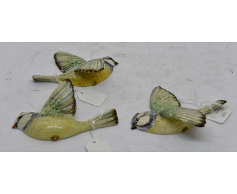 Beswick Blue Tit wall plaques; numbers 705, 706, 707 (3)No obvious signs of damage or restoration. Black Beswick, England bac