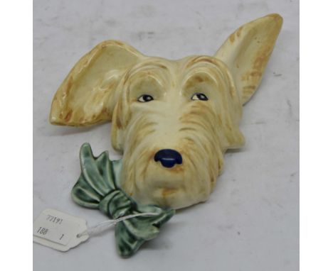 Beswick Sealyham wall plaque; number 373, bow on left, cream dog with green bow