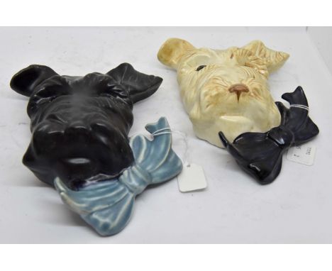 Beswick Sealyham wall plaques; number 301, cream, blue bow satin finish, black turquoise bow (2)