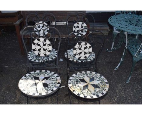 Four metal framed and tile finished garden chairs