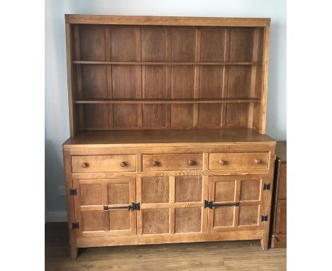 An oak dresser by Rabbit man, Peter Heap. 47 d x 153 w x 178cmsh. Condition ReportLight water marks and cup ring mark to the 