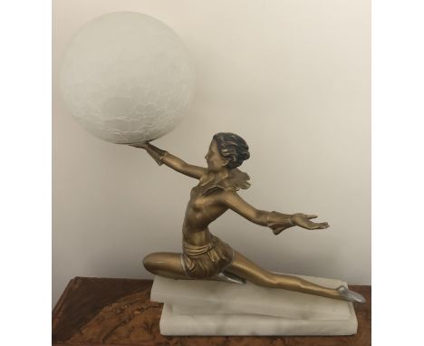 Art Deco figural table lamp in the manner of Josef Lorenzl, no signature, on onyx base with crackle glass ball shade. 27cms h