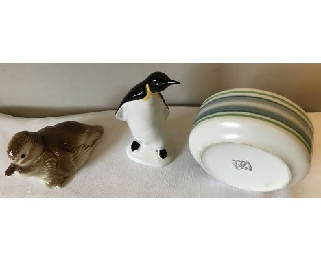 Poole pottery to include a penguin 14cm h, duckling and bowl.