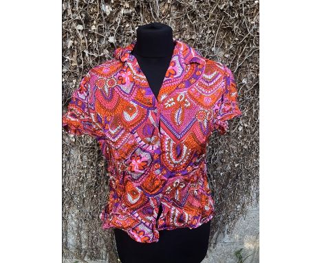 Two 1960's blouses, size 40 and a pair of vintage jodhpurs. 