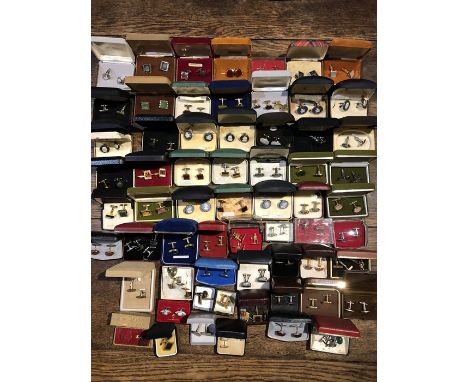 A large quantity of vintage cufflinks in original boxes including Wedgwood cufflinks by Stratton, bloodstone, 9 ct gold on si