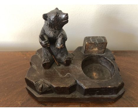 A vintage carved black forest bear match holder. 13 x 8cms.