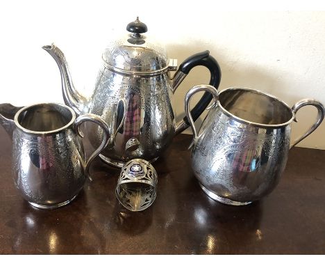 Silver plate teapot, milk and sugar with a White Star Line plated napkin ring. 