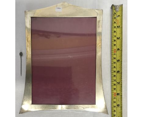 A silver Art Deco style frame, Birmingham 25cm h x 20.5cm w. and a white metal pin with clear cut stone 5.5cm.