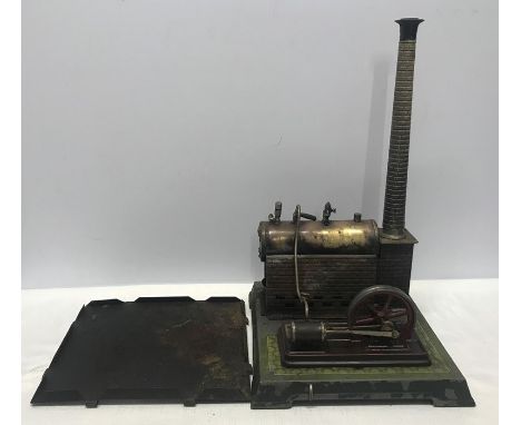A Bing Bavaria tinplate model steam engine.Condition ReportPlayworn, wear to paint, burn marks to boiler housing.&nbsp;