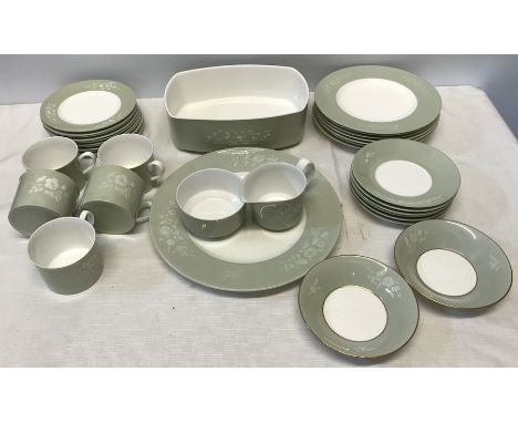 Dinner and tea ware, green and white embossed floral decoration, 32 pieces together with two small Royal Worcester Sheraton b