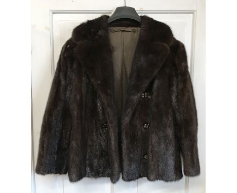 Vintage short mink jacket, approximate size 14. Good condition. 
