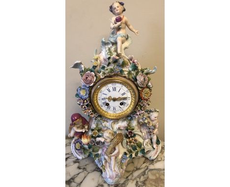 A Dresden flower encrusted mantle clock, late 19thC, 49cms h, nibbles to flowers in places. Condition ReportChips to some flo