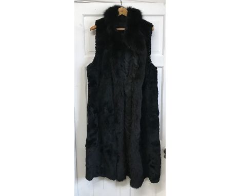 A vintage black long fur gillet. Condition ReportA/f to one underarm.&nbsp;
