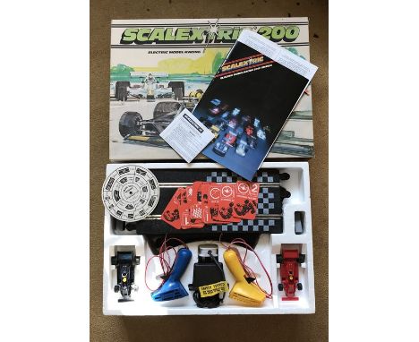 Scalextric 200 electric model racing game, boxed, play worn, with instruction booklet. 