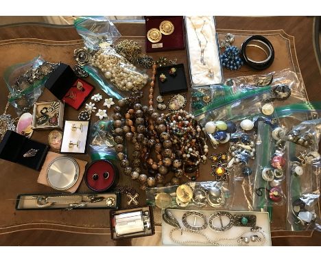 A large quantity of vintage costume jewellery to include hatpins, compact, Ronson lighter etc.