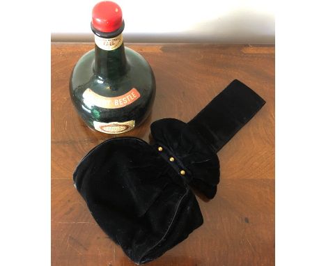 A musical, empty cherry Bestle bottle with a velvet vintage evening bag, good condition.