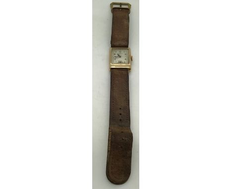 A gentleman's early 9ct gold Audax manual wind wrist watch, with rectangular Arabic dial and subsidiary seconds. Inscribed to