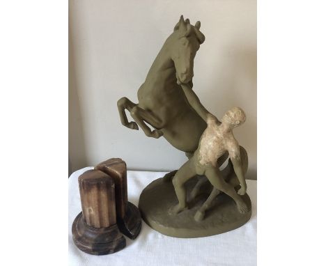 Marble column bookends and a Goldscheider model of a man and horse (painted) 42cms h. 