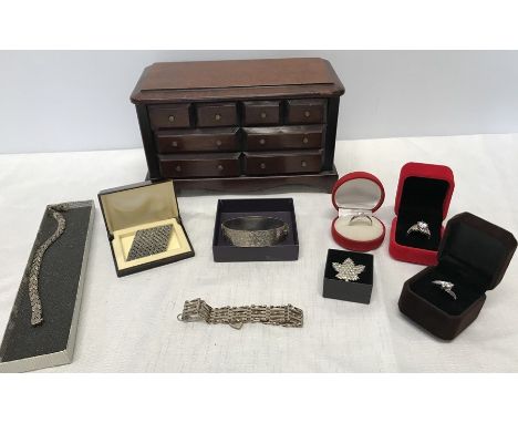 Silver 925 jewellery including a gate bracelet, bangle. brooches. 3 rings set with clear stones and a jewellery box. 