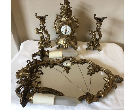 Brass clock Garniture and light fitting with mirror. 26cm h.Condition ReportAt fault.