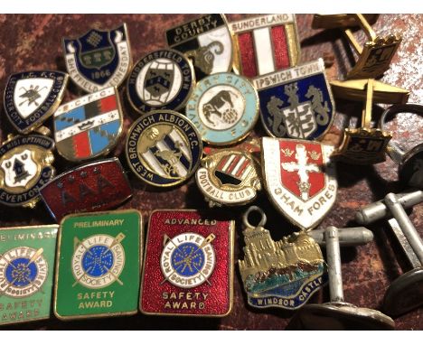 Various football club and other enamel badges.