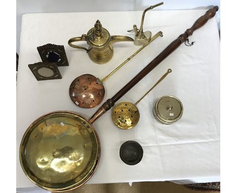 A collection of Brass and Copper to include eight items, three bedpans, two ornate frames, engraved Middle Eastern teapot, sm