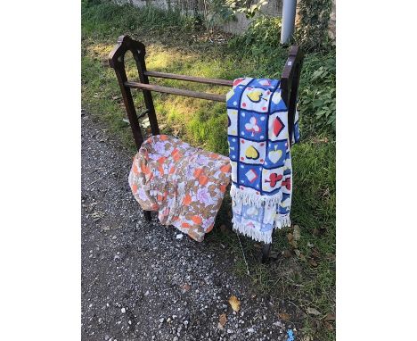 Victorian towel rail together with a pair of 1960's cotton curtains and a vintage towel. 