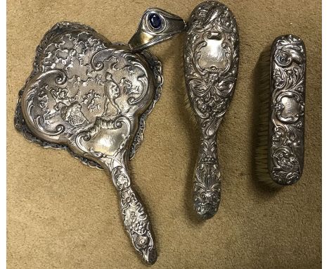 Hallmarked silver three piece vanity set, embossed decoration, London 1898 together with a hallmarked silver Celtic style ban