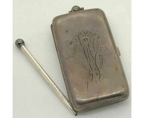 A good quality silver cigarette, sovereign, half sovereign and stamp holder with pencil to top. Birmingham 1906, maker Willia