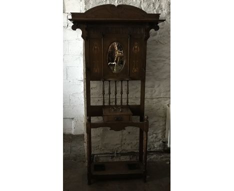 Victorian oak hallstand with Art Noveau inlaid panels, mirrored back, top shelf and single drawer. 206 h x 102 w x 29cms d.Go