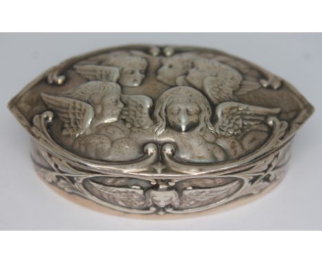 A silver snuff box embossed with winged cherubs, William Comyns, London 1901, length 77mm.  